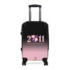 faded pink and black suitcases