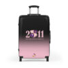faded pink and black suitcases