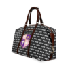 Designer patterned tote bag with brown leather straps.